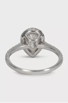 White gold ring with a pear-shaped diamond