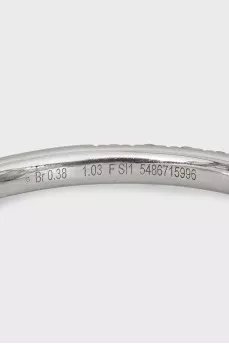 White gold ring with a pear-shaped diamond