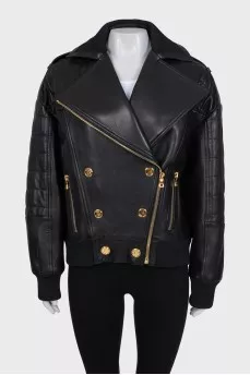 Leather jacket with gold buttons
