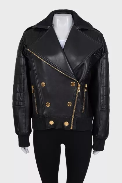 Leather jacket with gold buttons