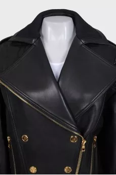 Leather jacket with gold buttons