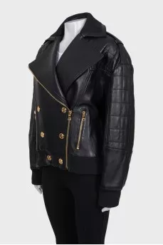 Leather jacket with gold buttons