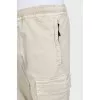Men's tapered trousers with a branded patch