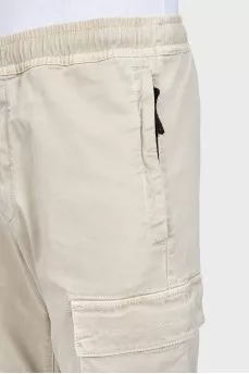 Men's tapered trousers with a branded patch
