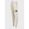 Men's tapered trousers with a branded patch