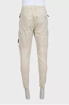 Men's tapered trousers with a branded patch