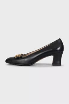 Leather high heels with signature embellishments