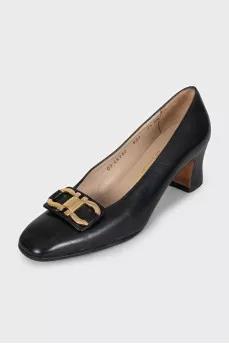Leather high heels with signature embellishments
