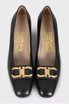Leather high heels with signature embellishments