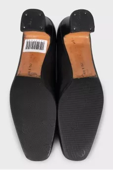 Leather high heels with signature embellishments