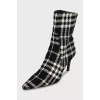 Black and white textile ankle boots