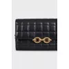 Quilted leather bag with chain
