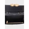 Quilted leather bag with chain