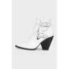 White leather ankle boots