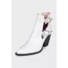 White leather ankle boots