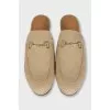 Textile clogs with a signature print and tag
