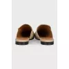 Textile clogs with a signature print and tag
