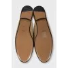 Textile clogs with a signature print and tag