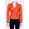 Orange leather jacket with a zipper