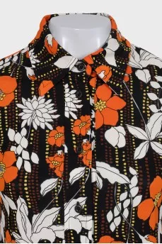 Black straight-cut blouse with a floral print