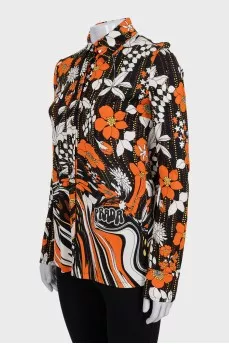 Black straight-cut blouse with a floral print