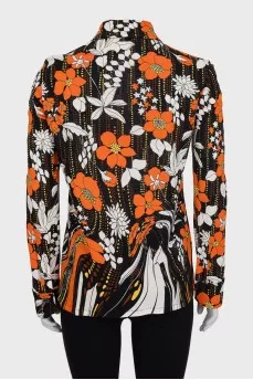 Black straight-cut blouse with a floral print