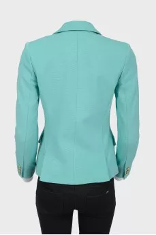 Turquoise jacket with golden buttons