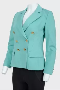 Turquoise jacket with golden buttons