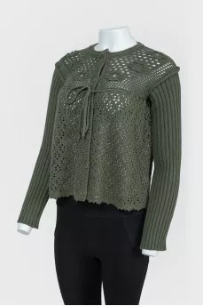 Knitted green jumper with buttons