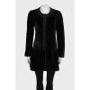 A cropped fitted coat with buttons