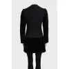 A cropped fitted coat with buttons