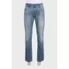 Men's straight-leg jeans with a distressed effect