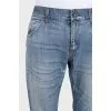 Men's straight-leg jeans with a distressed effect