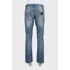 Men's straight-leg jeans with a distressed effect