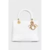 Стеганая сумка Lady Dior из кожи