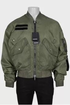 Men's green bomber jacket with tag
