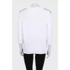 White sweater with shoulder embellishments