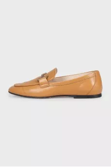 Brown leather loafers