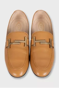Brown leather loafers