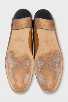 Brown leather loafers