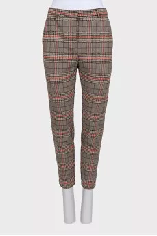 Beige tapered trousers with a plaid print