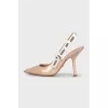 Beige slingbacks with the J'Adior logo