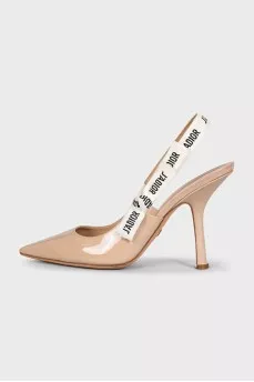 Beige slingbacks with the J'Adior logo
