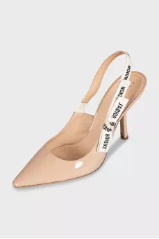 Beige slingbacks with the J'Adior logo