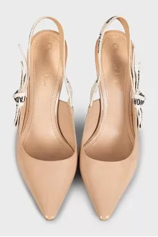 Beige slingbacks with the J'Adior logo