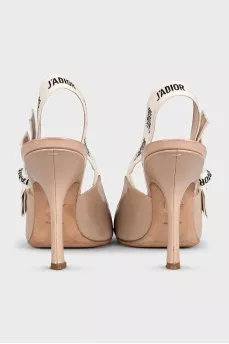 Beige slingbacks with the J'Adior logo