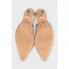 Beige slingbacks with the J'Adior logo