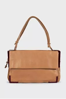 Leather shoulder bag with metal decor