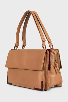 Leather shoulder bag with metal decor