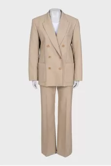 Double-breasted suit in beige